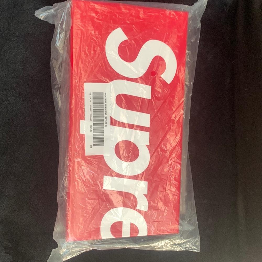 Supreme spray paint cans